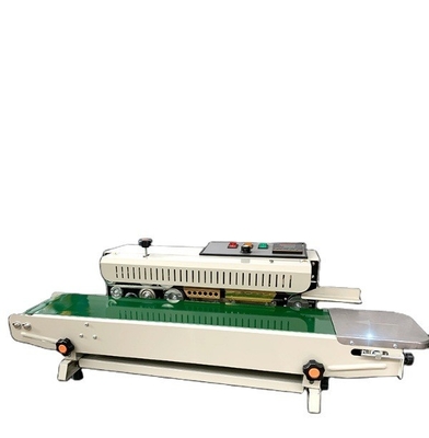 Ταχύτητα σφράγισης 0-12m/min 29kg FR-990 Πιο δημοφιλής θερμική σφραγιστική μηχανή για συσκευασία τροφίμων