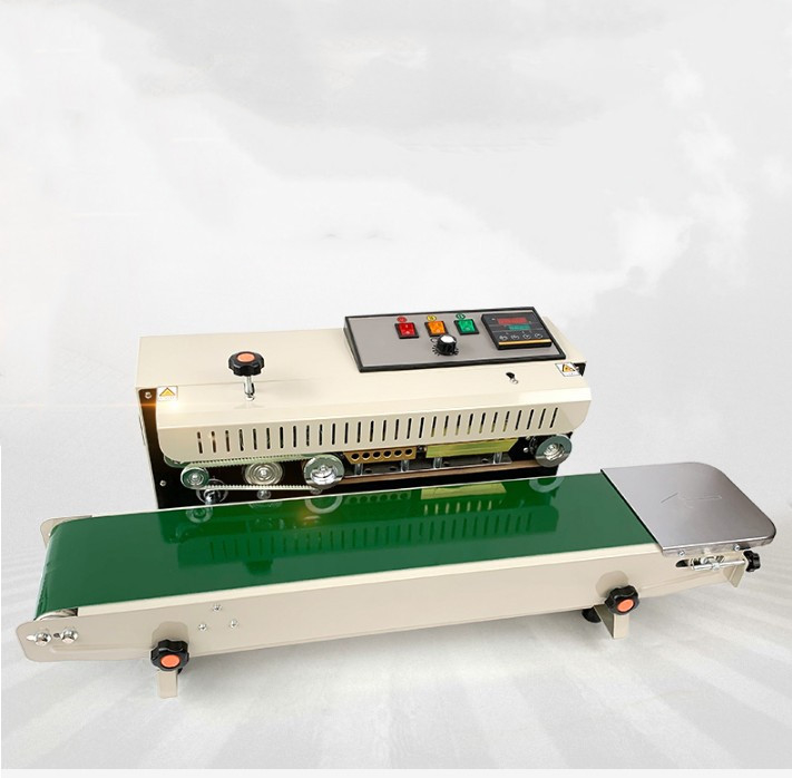 220V/50HZ FR-900 Συνεχή μηχανή σφράγισης ταινιών για πλαστικές σακούλες Περιοχή θερμοκρασίας 0-300C